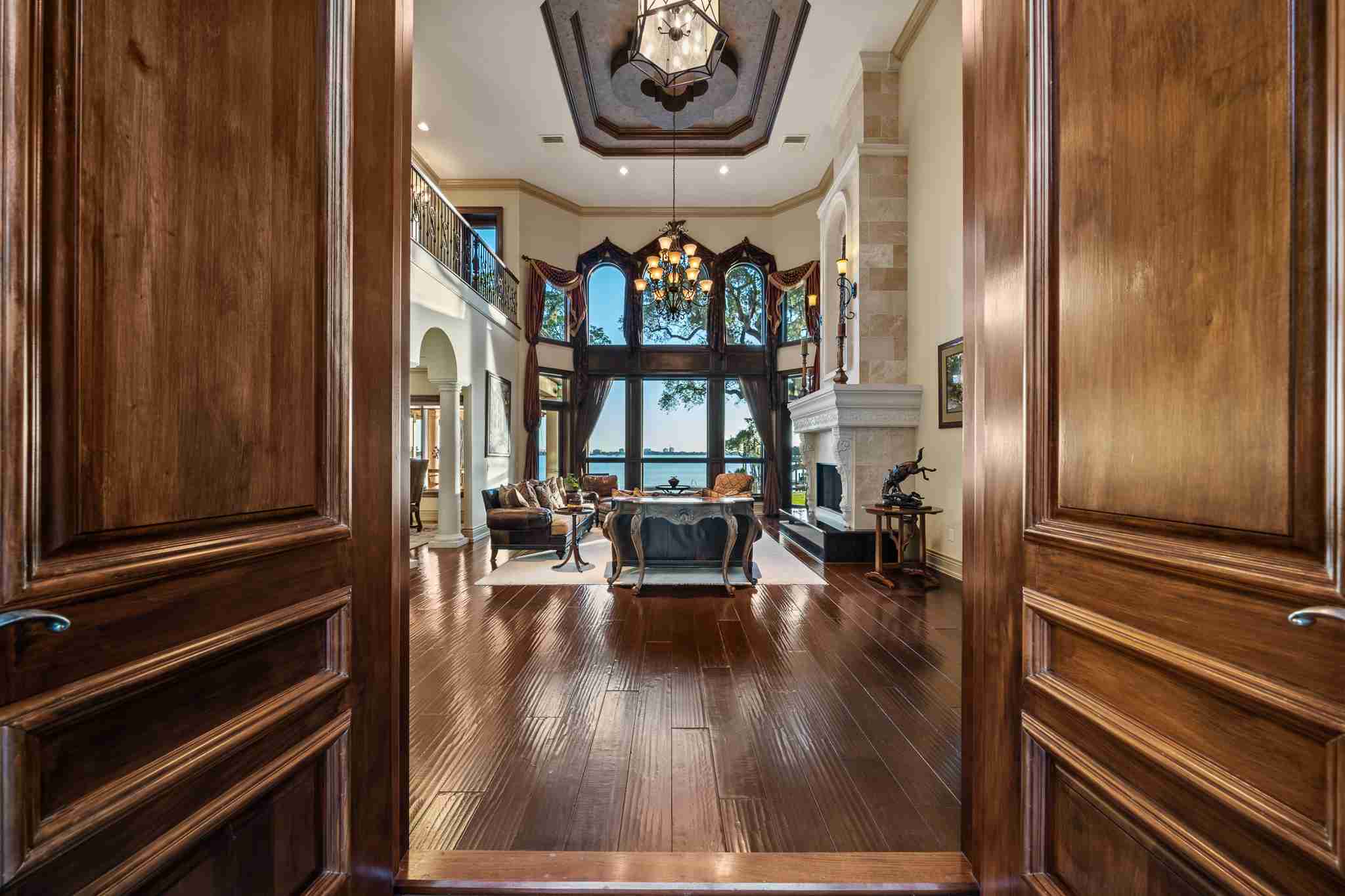 808 N Riverside Drive Indialantic FL 32903 (6) Wooden doors open to reveal a lavish great room